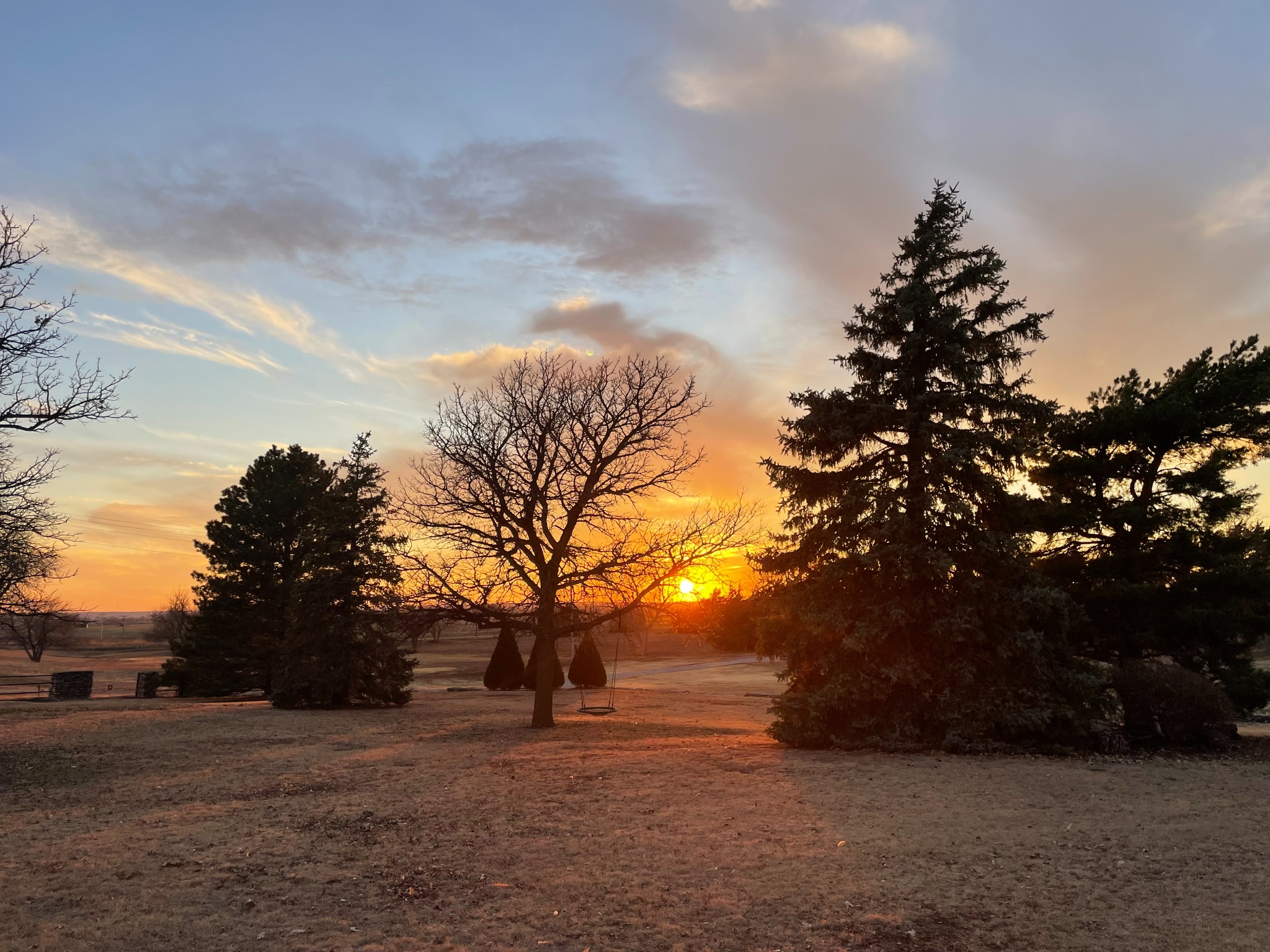 Farmhouse on the prairie at dusk