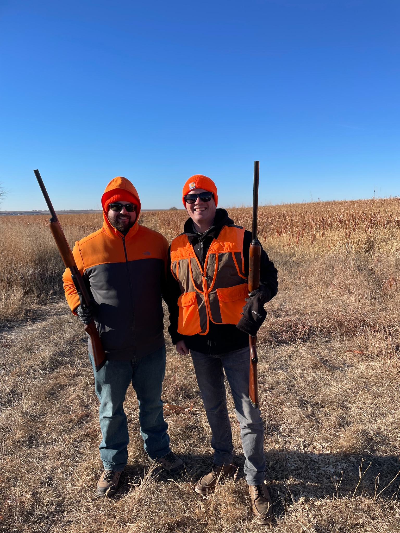 Two hunters in the field
